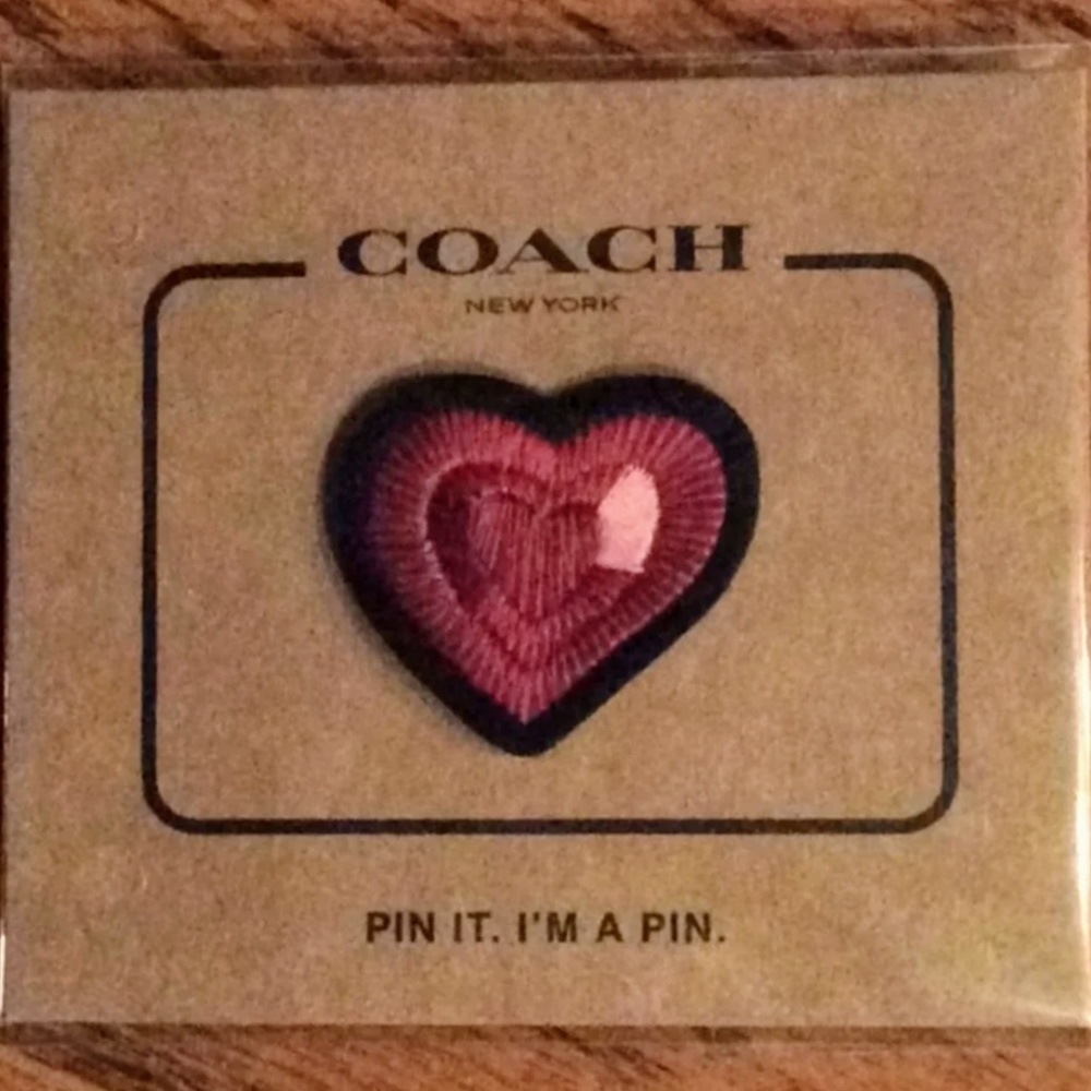 Coach pin NWT.
